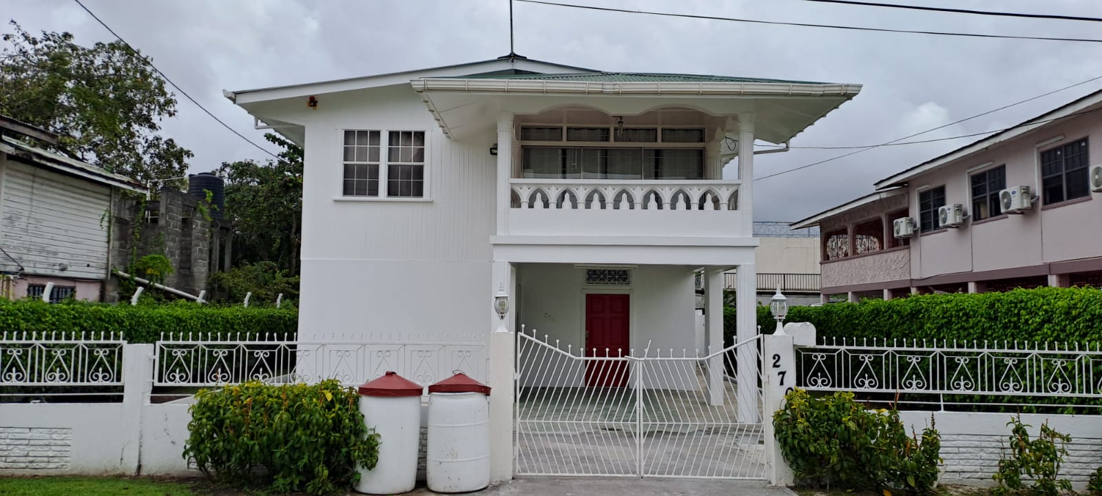 Secure Family Living: Spacious House with Garage and AC